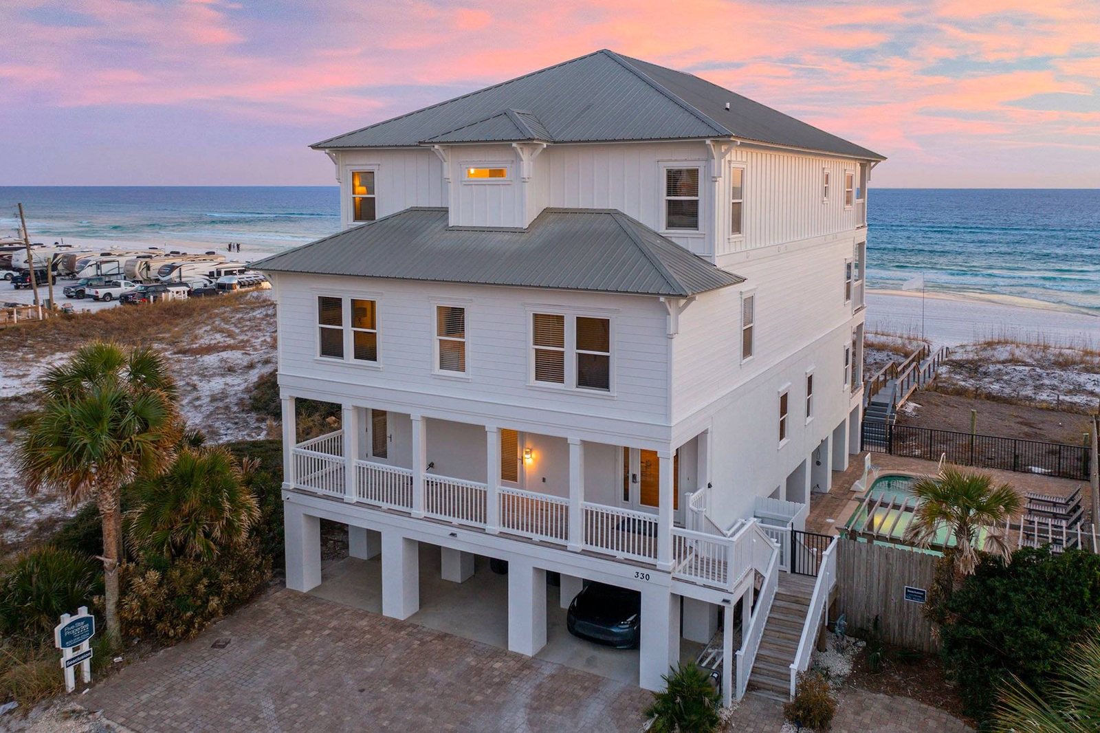 Dusk view of the gulf-front house from above