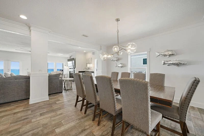 Living room with seating and a view toward the beach